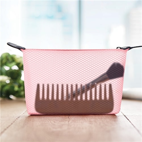 Pochette beauty rosa con pettine e pennello beauty all'interno